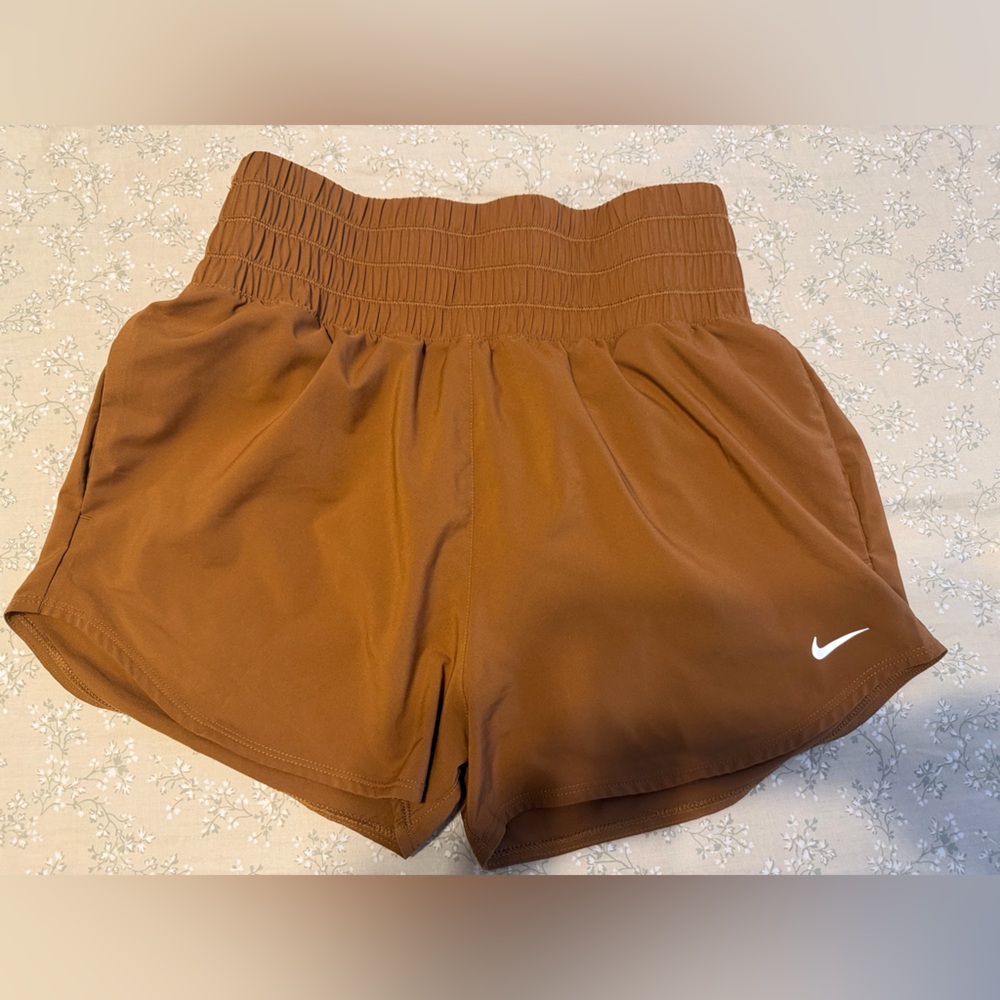 Nike Women's High-Waist Athletic Shorts in Rust